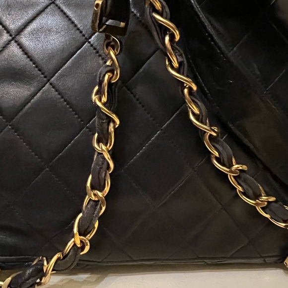 CHANEL Black Quilted Backpack with Gold Logo - Picture 10 of 16